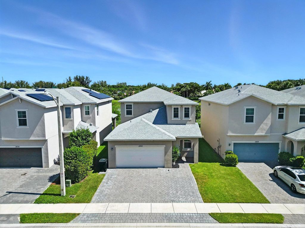 Photo of 1824 Lake Cove Drive, Lake Worth Beach, FL 33460 (MLS # R11114070)