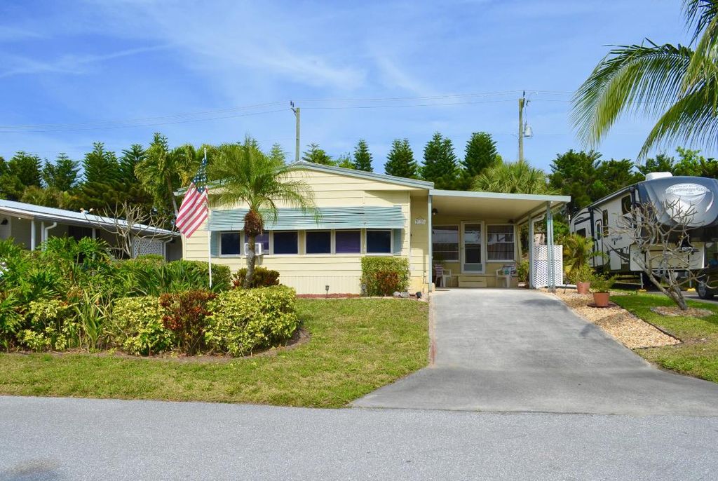 Photo of 8031 SE Homestead Avenue, Hobe Sound, FL 33455 (MLS # R11155431)