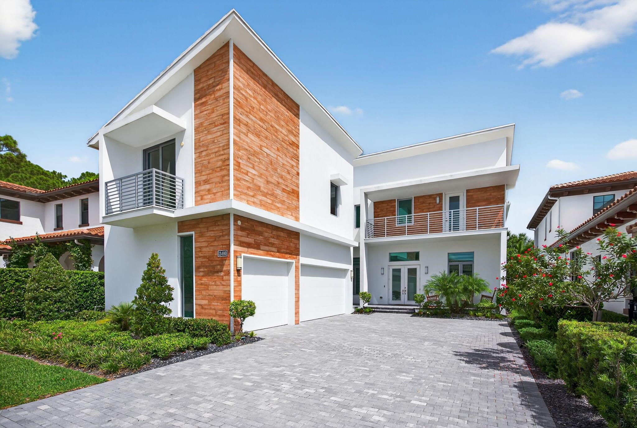 This beautifully designed contemporary House is situated in heart of the highly sought after neighborhood of Alton. Only 3 minute's walk to the Clubhouse which features a resort style pool, modern state of the art Gym, Basketball, Volleyball, Tennis courts. In walking distance to Alton Town Center with easy access to shopping, entertainment, casual and fine dining and many more lifestyle services. Easy access to I-95 and in close proximity to excellent schools and hospitals and a short drive to the beautiful Jupiter and Juno beaches. 5 Bedrooms, 5 Baths, 3 separate living areas, 2 laundry rooms (one in each floor), two dining areas (formal and daily) and 2 bonus rooms that can be used as an office, gym or any other use as. Spacious covered patio with a outdoor kitchen and modern pool.