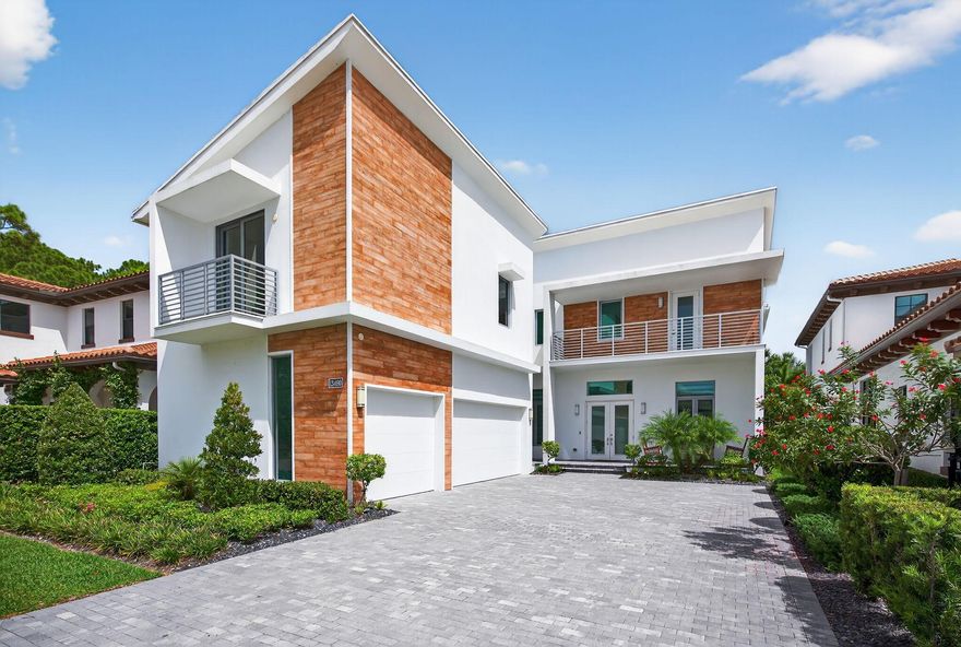 This beautifully designed contemporary House is situated in heart of the highly sought after neighborhood of Alton. Only 3 minute's walk to the Clubhouse which features a resort style pool, modern state of the art Gym, Basketball, Volleyball, Tennis courts. In walking distance to Alton Town Center with easy access to shopping, entertainment, casual and fine dining and many more lifestyle services. Easy access to I-95 and in close proximity to excellent schools and hospitals and a short drive to the beautiful Jupiter and Juno beaches.  5 Bedrooms, 5 Baths, 3 separate living areas, 2 laundry rooms (one in each floor), two dining areas (formal and daily) and 2 bonus rooms that can be used as an office, gym or any other use as. Spacious covered patio with a outdoor kitchen and modern pool.