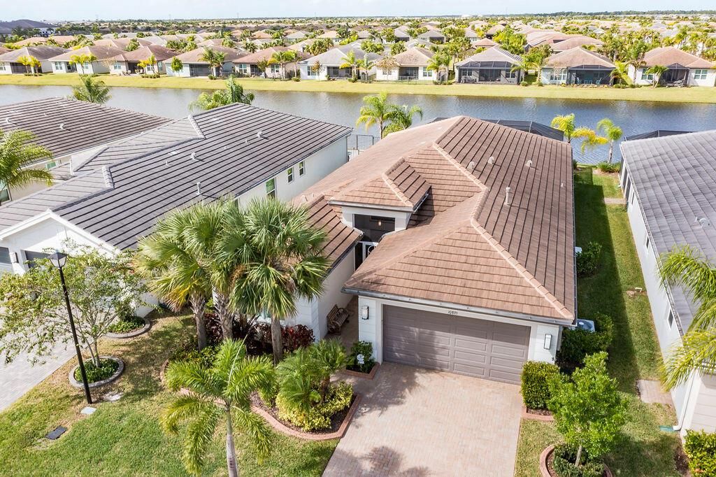 Photo of 10895 SW Sunray Street, Port Saint Lucie, FL 34987 (MLS # R10934350)