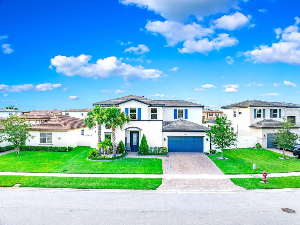 Photo of 7589 NW Greenspring Street, Port Saint Lucie, FL 34987 (MLS # R11015980)