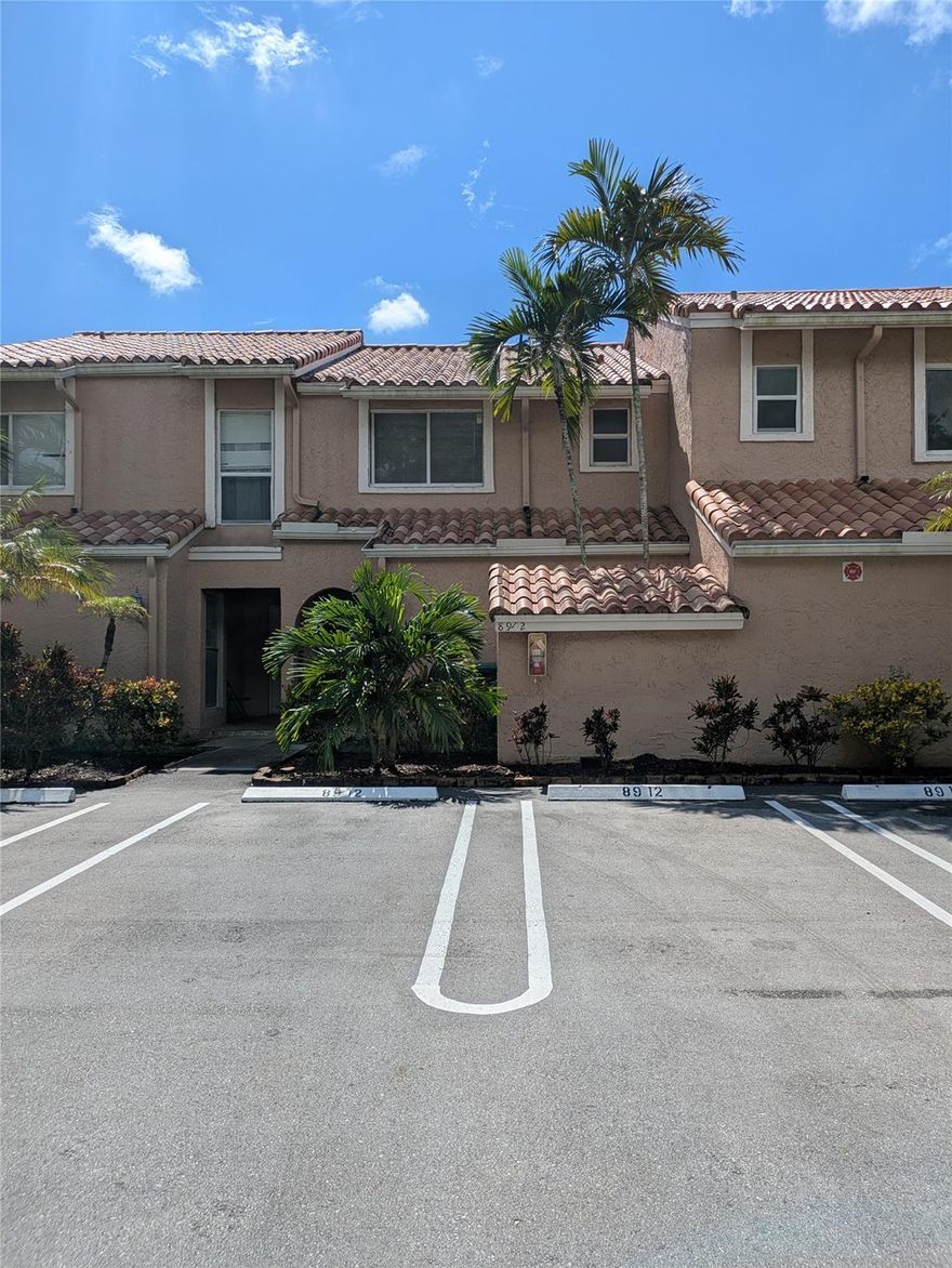 Don't miss out on this one of a kind townhome! Small boutique and well-kept community. Townhome is beautiful and spacious, completely tiled (only carpet on the stairs). Enjoy cooking in the large kitchen which features granite countertops, pantry and lots of cabinets. Upstairs you will find 2 master suites. Open patio in the back which overlooks the upscale community of Coral Lago. Extra storage in front porch. Yes water is included. Unit has been freshly painted & cleaned, just waiting for you to move in!!
