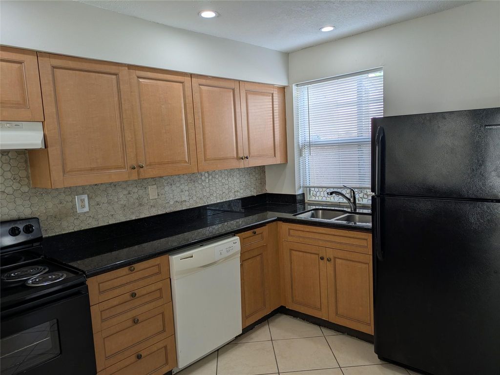 Photo of 8912 NW 38th Drive #8912, Coral Springs, FL 33065 (MLS # F10530880)