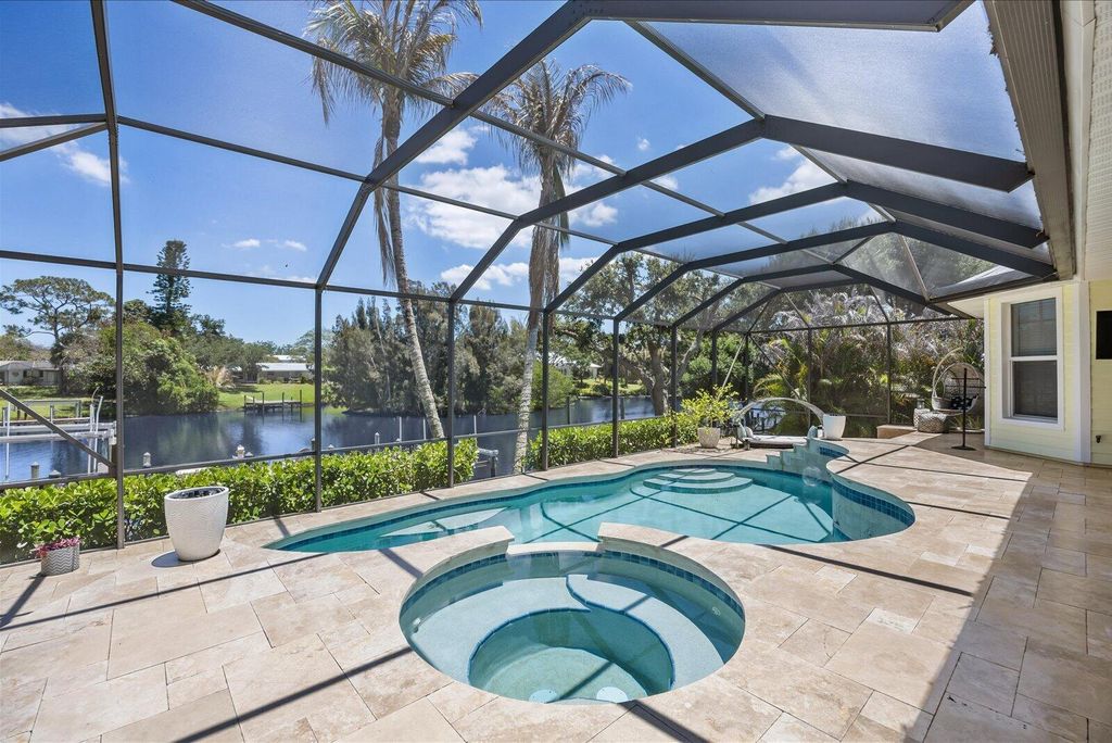 Photo of 851 SW Pine Tree Lane, Palm City, FL 34990 (MLS # B26027711)
