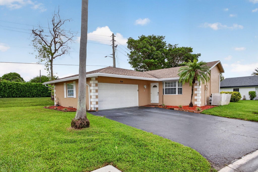 Photo of 7516 NW 88th Terrace, Tamarac, FL 33321 (MLS # B26070463)
