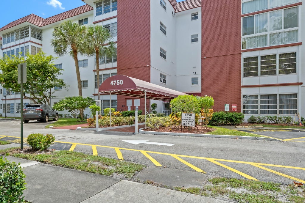 Photo of 4750 NW 22ND Court #408, Lauderhill, FL 33313 (MLS # B26072404)