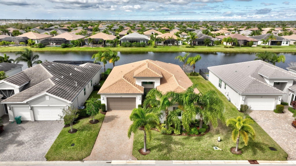 Photo of 11039 SW Ivory Springs Lane, Port Saint Lucie, FL 34987 (MLS # R11065995)