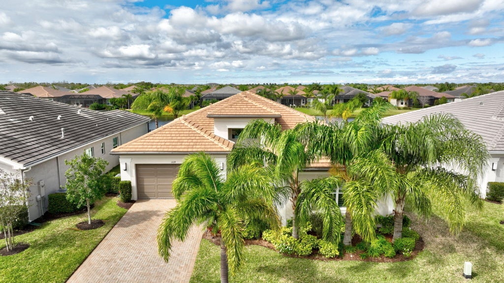 Photo of 11039 SW Ivory Springs Lane, Port Saint Lucie, FL 34987 (MLS # R11065995)