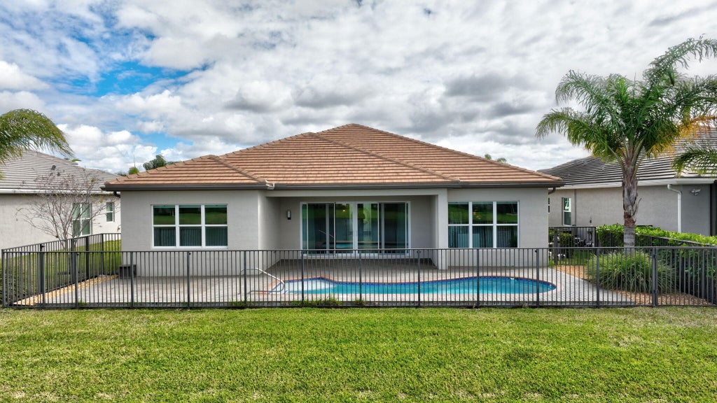 Photo of 11039 SW Ivory Springs Lane, Port Saint Lucie, FL 34987 (MLS # R11065995)