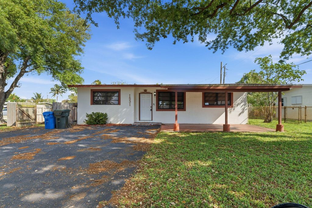 Photo of 1531 NW 41st Court, Oakland Park, FL 33309 (MLS # B26010476)