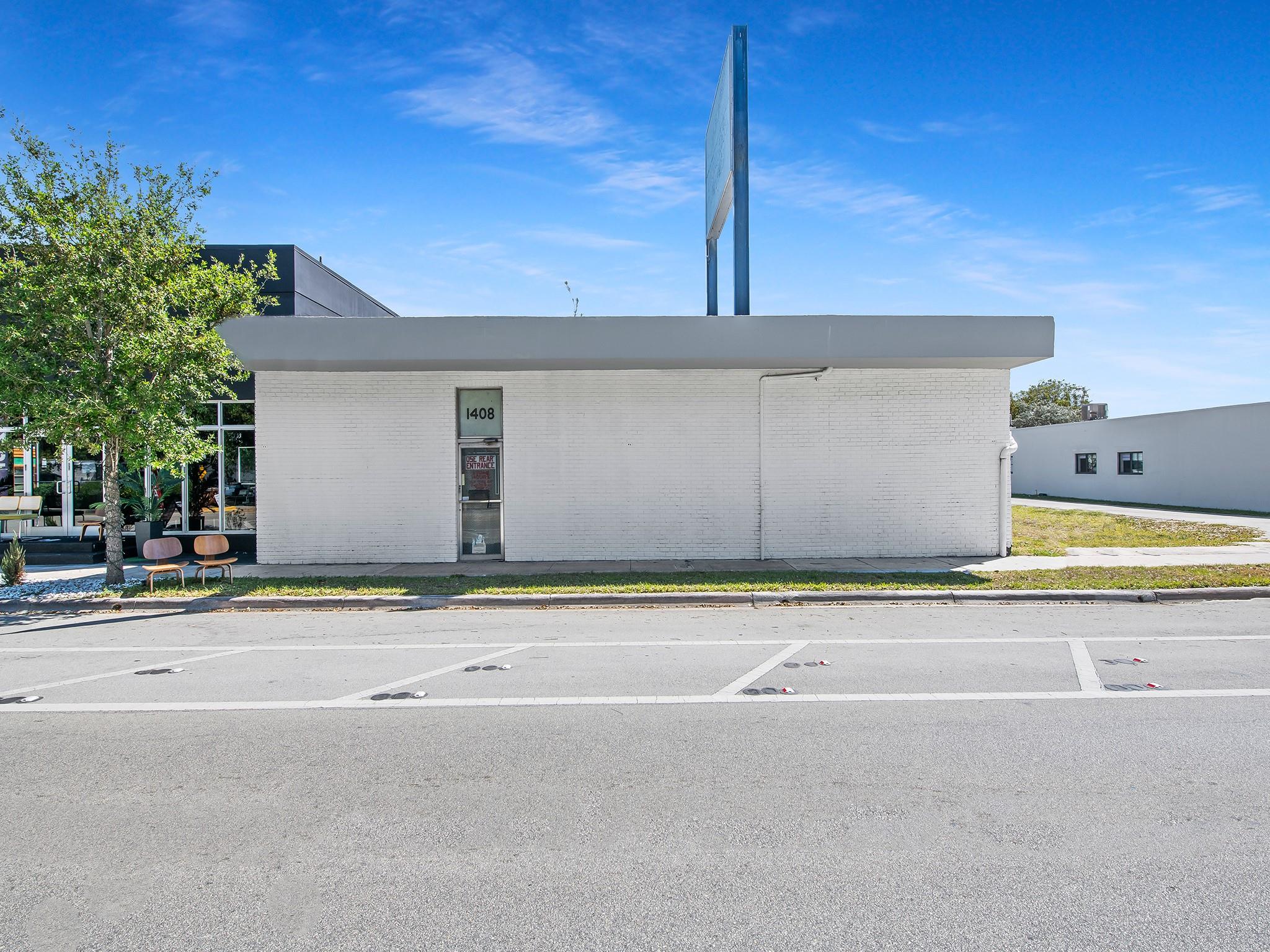 Well-located commercial retail/office property in Studio City, directly on N.E. 4th Avenue between Flagler Village and Wilton Manors. Includes two additional commercial lots for overflow parking or potential redevelopment. Positioned near 1B+ projects like Searstown and FAT Village, the area is experiencing rapid growth and investment. The building features two roll-up bay doors and a gray shell interior, offering flexible, open space for retail, creative workspace, or light industrial use. Zoned for a variety of commercial uses, it’s ideal for businesses or developers in a dynamic, evolving market.