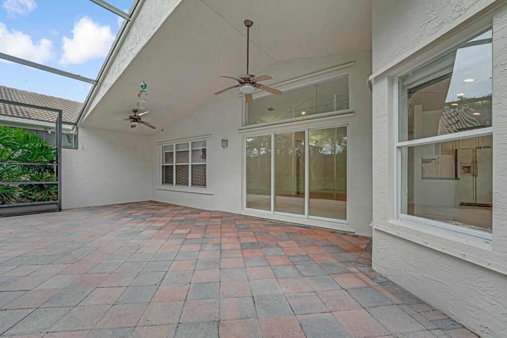 WOW! PRICED TO SELL! Fabulous location,extended large screened lanai,totally private backyard, not near any major roads, this home is one of the best buys in all Valencia's! Neutral tile,this floorpan boasts an open setting, lots of light & is walking distance to both the Social Clubhouse & the renowned state of art Athletic Center! One of the most sought after models,enjoy a tree shaded walking path to 6 pickleball, 3 bocce, 10 tennis crts, 2 indoor racquetball crts,THE BISTRO, social tropical pool, lap & resistance pools, indoorwhirlpool, beauty salon , shows, cards, mah Jong, amenities galore!HOA includes lawn maintenance, hi speed wi-fi, internet, cable TV, Bistro credit,security system,painting of outside of house & more! Make this home your own! LIVE THE VALENCIA LIFE! LOVE IT!