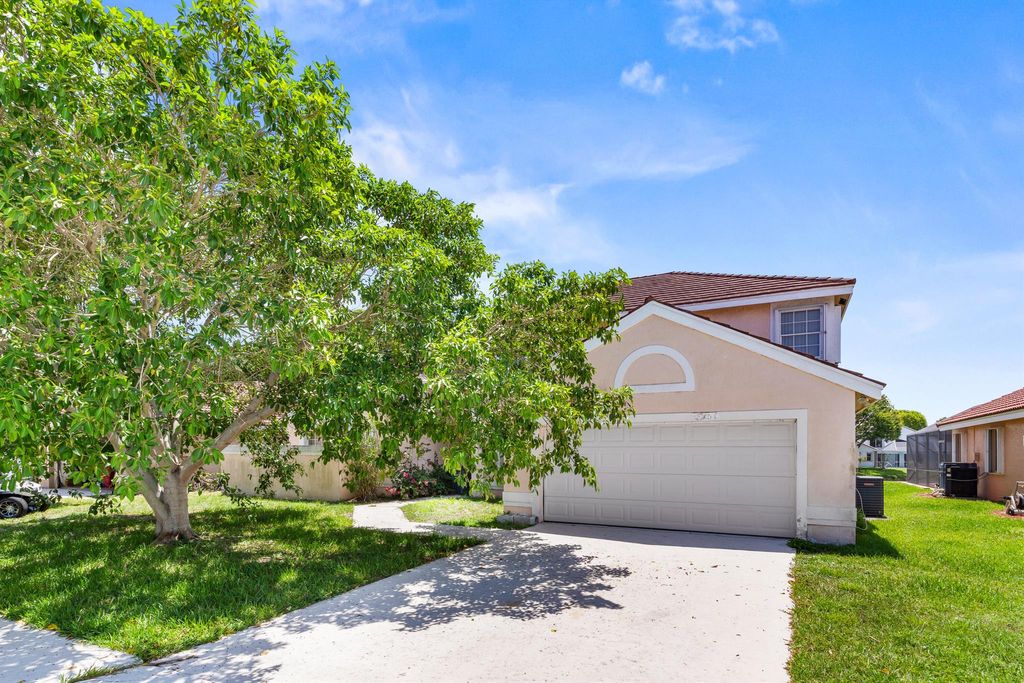 Photo of 8885 Spring Valley Drive, Boynton Beach, FL 33472 (MLS # R11098543)
