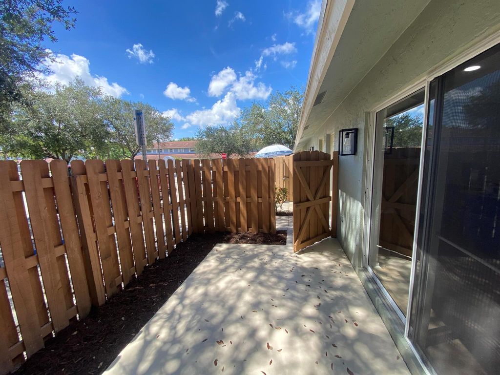 Photo of 1500 Cypress Way E, Palm Springs, FL 33406 (MLS # R11116193)