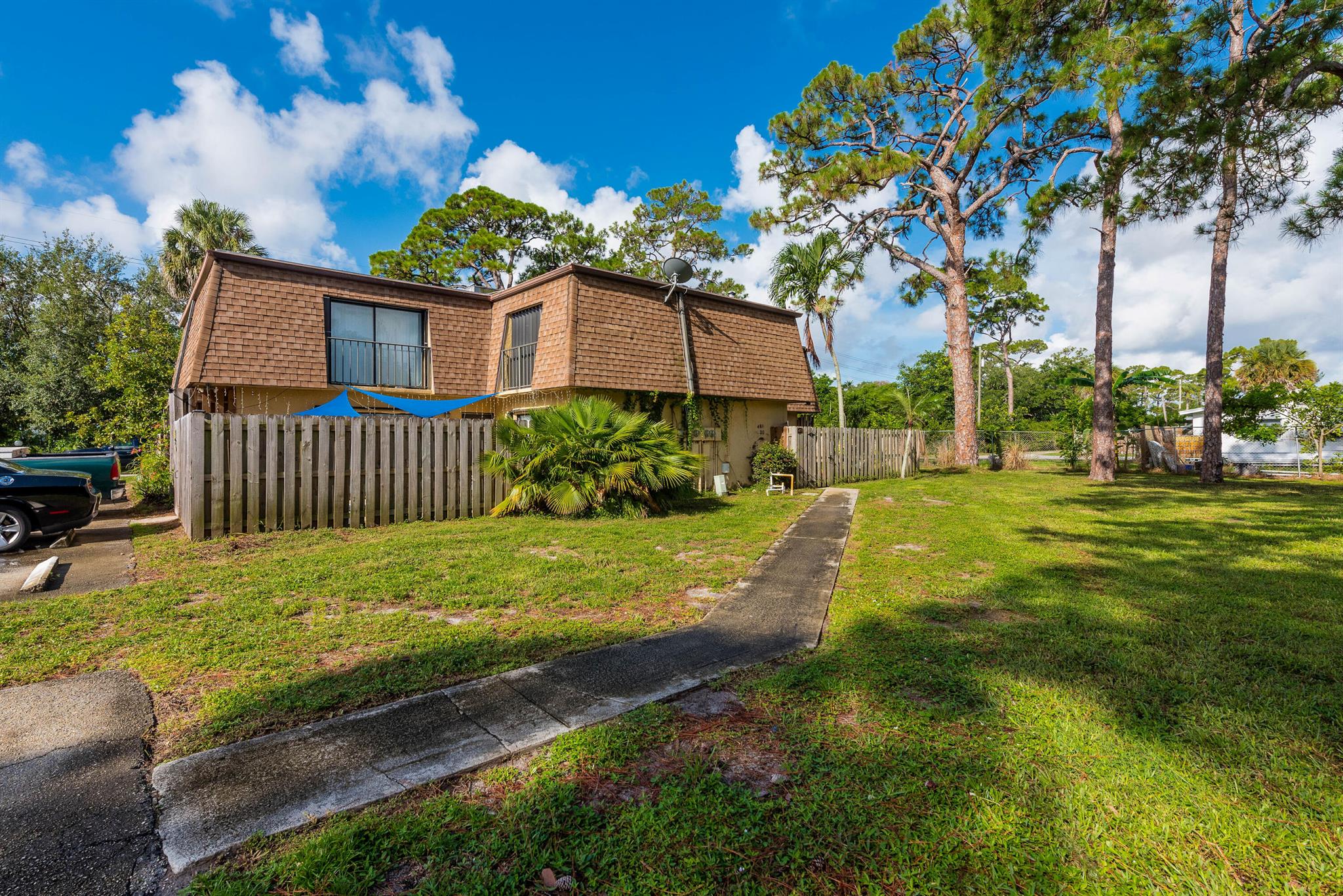 Live the Palm Beach lifestyle in this charming and fully renovated 2-bedroom, 2.5-bath townhome! Everything is brand new--kitchen, cabinets, countertops, bathrooms, flooring, appliances, fans and more. Nestled in a quiet, small community with a private fenced patio surrounded by greenery. Low HOA fees. Prime location just 8 minutes from Palm Beach International Airport and close to Downtown West Palm Beach, beaches, restaurants, I-95, and the Turnpike. Smart layout freshly painted and move-in ready. Perfect for first-time buyers or investors. Don't miss this turnkey gem in one of West Palm's most desirable areas!