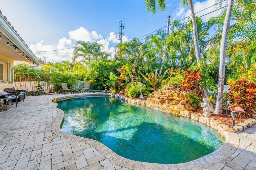 Photo of 451 NE 25th Terrace, Boca Raton, FL 33431 (MLS # R10996875)