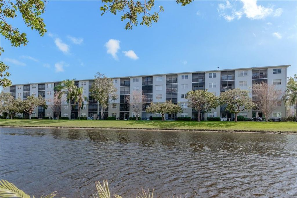 Photo of 2230 N Cypress Bend Dr #304, Pompano Beach, FL 33069 (MLS # F10387047)