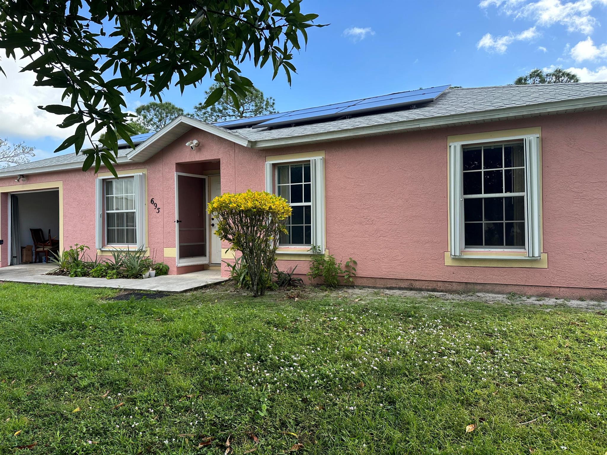 This Cozy Home is Ready for It's New Family. Enjoy the Benefit of Solar with a Limited Electric Bill. Available for Immediate Occupancy. This Property boasts Vaulted Ceilings, Open Concept, Extended Driveway, Large Fenced Yard & An Expansive Covered & Screened Patio.