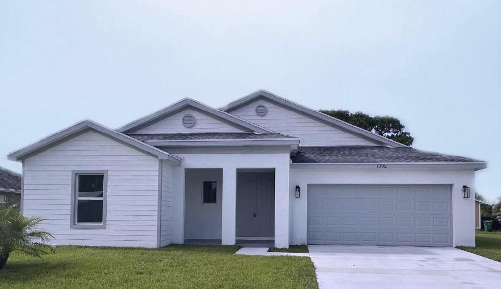 Photo of 1092 SW Whittier Terrace, Port St Lucie, FL 34953 (MLS # R10908387)
