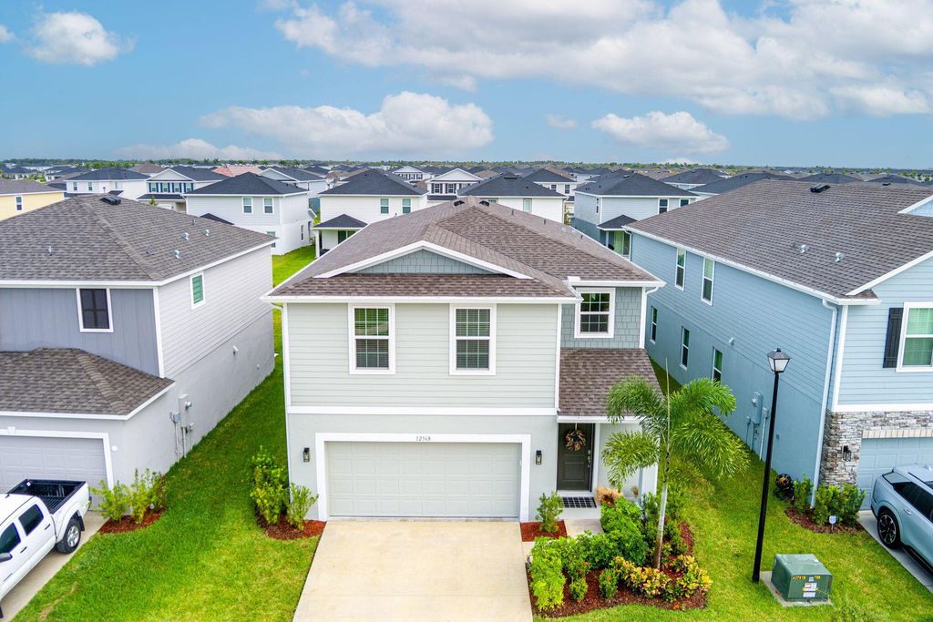 Photo of 12568 SW Forli Way, Port Saint Lucie, FL 34987 (MLS # R11130261)