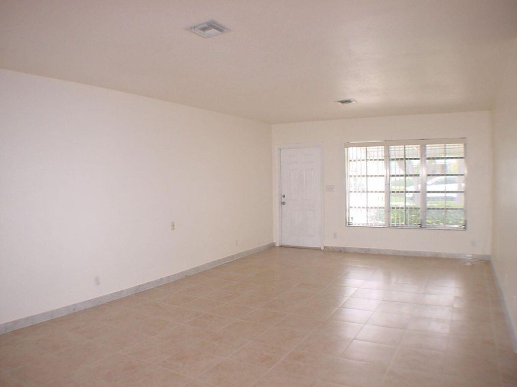 Photo of 590 NE Wavecrest Way, Boca Raton, FL 33432 (MLS # R11127357)