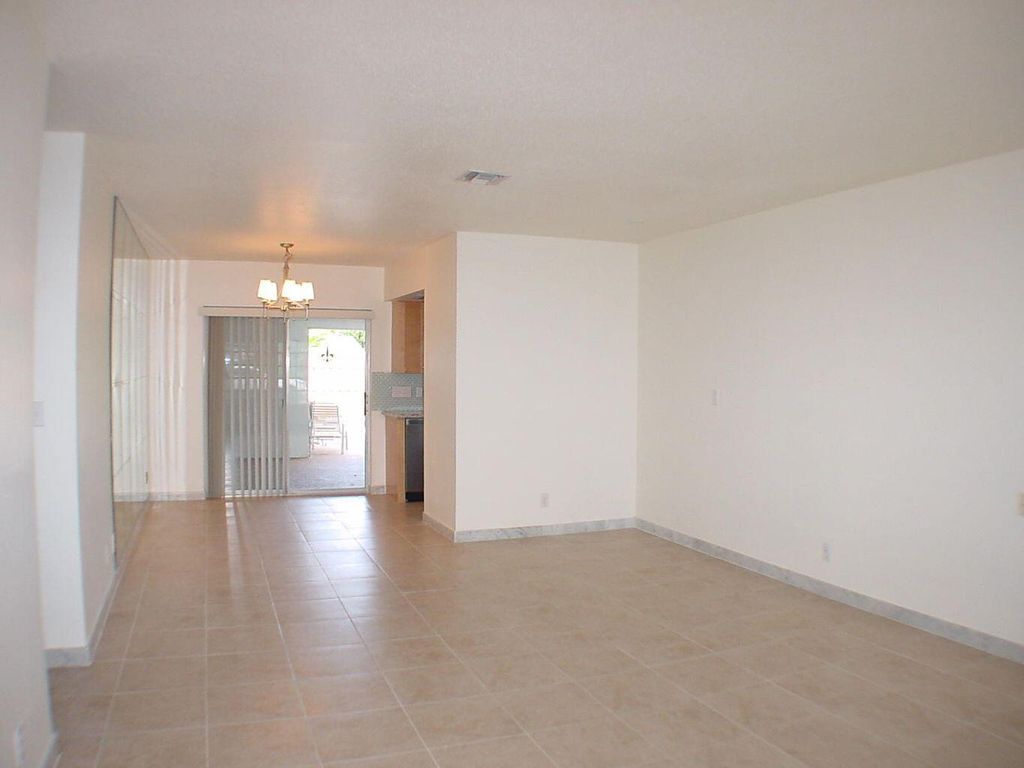 Photo of 590 NE Wavecrest Way, Boca Raton, FL 33432 (MLS # R11127357)