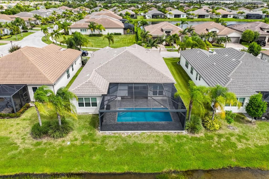 Photo of 10985 SW Ivory Springs Lane, Port Saint Lucie, FL 34987 (MLS # R11128951)