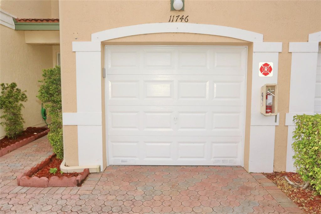 Photo of 11746 NW 47th Drive #11746, Coral Springs, FL 33076 (MLS # F10464838)