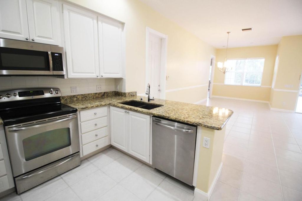 Photo of 256 San Remo Drive, Jupiter, FL 33458 (MLS # R10963514)