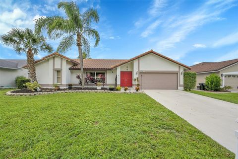 Photo of 5149 NW 47th Ave, Coconut Creek, FL 33073 (MLS # F10534597)