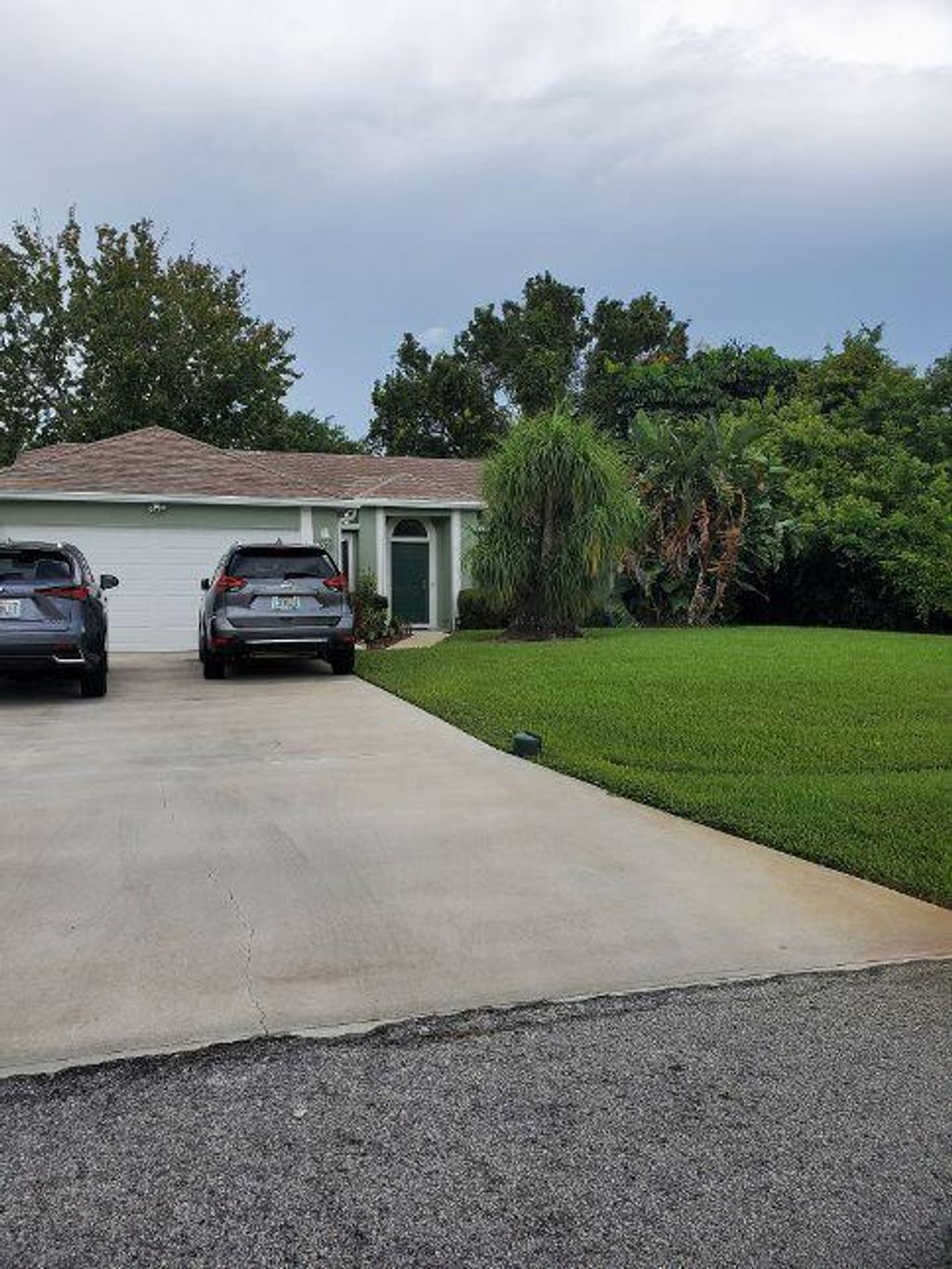 Photo of 1461 SE Grapeland Avenue, Port Saint Lucie, FL 34952 (MLS # R10751088)