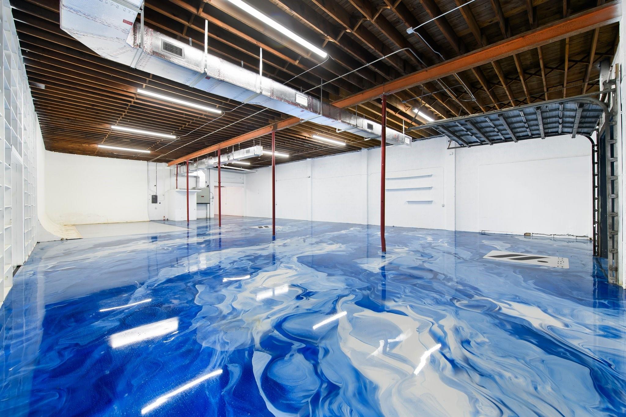 FULLY AIR-CONDITIONED SPACE WITH HIGH END EPOXY FLOORS. Discover an exceptional flex industrial space just minutes from Downtown Fort Lauderdale and bustling Flagler Village. This versatile property boasts a wide-open layout, perfect for various uses, from creative studios to light manufacturing or automotive. The space features an expansive open floor plan, with over 16’ clear ceiling height in most of the space, and over 20’ in the rear warehouse. Rear exterior patio space with endless possibilities, or additional storage.
It is located only blocks away from multiple mixed-use developments and new businesses. Featuring convenient access to major highways, Fort Lauderdale airport, and the Port.