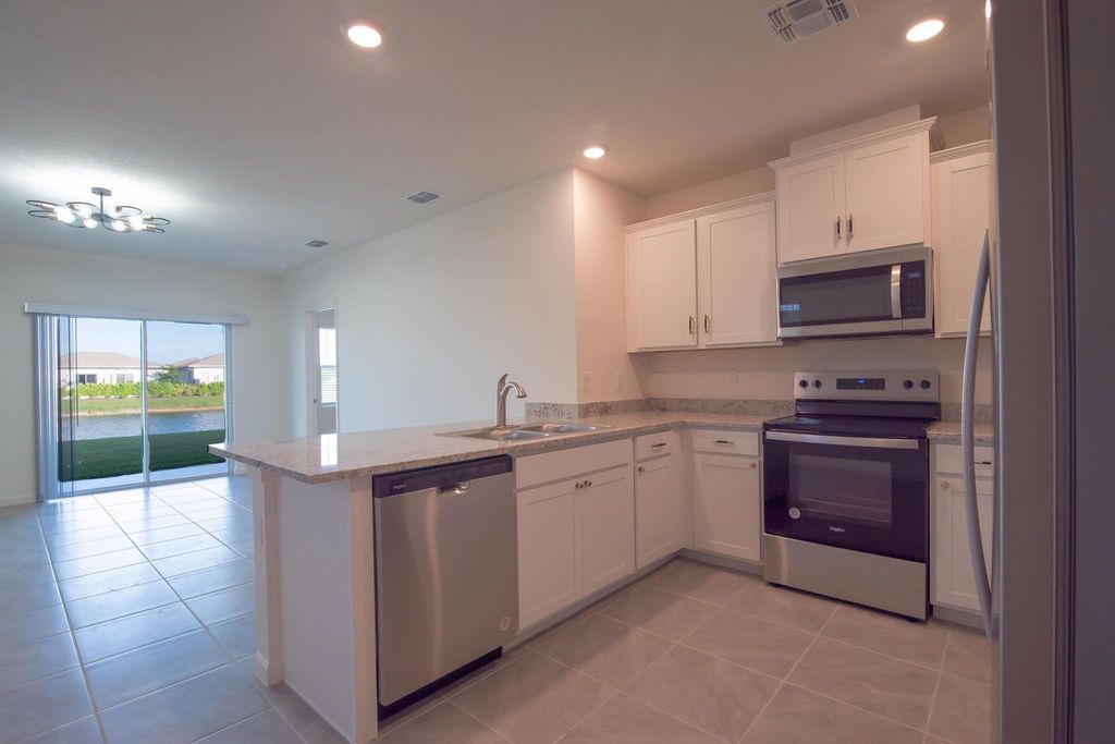 Photo of 12152 Rimini Way, Port Saint Lucie, FL 34987 (MLS # R11140022)