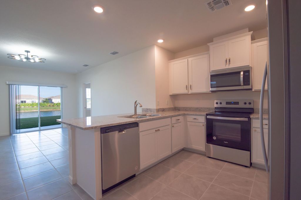 Photo of 12152 Rimini Way, Port Saint Lucie, FL 34987 (MLS # R11140022)