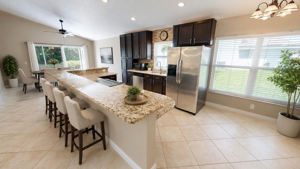 Photo of 562 SW Saint Martins Cove, Port Saint Lucie, FL 34986 (MLS # B26033771)