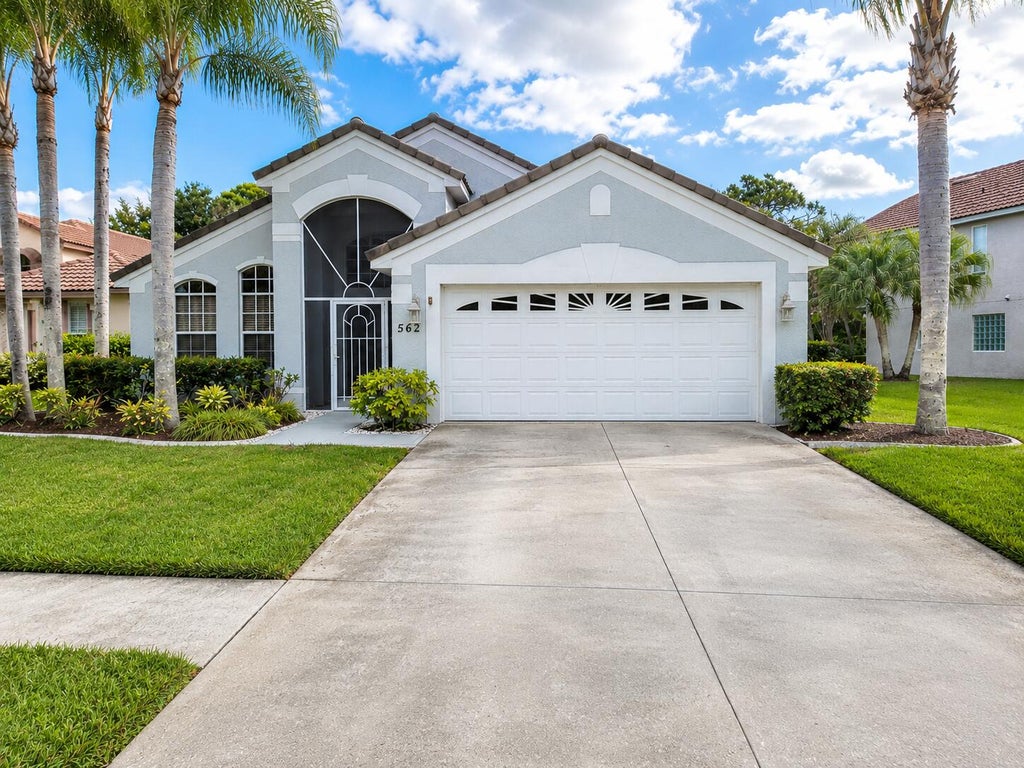 Photo of 562 SW Saint Martins Cove, Port Saint Lucie, FL 34986 (MLS # B26033771)
