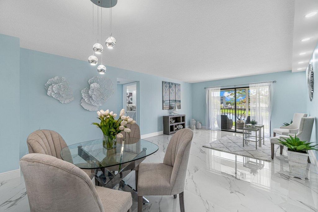 Photo of 7076 Huntington Lane #207, Delray Beach, FL 33446 (MLS # R10812576)