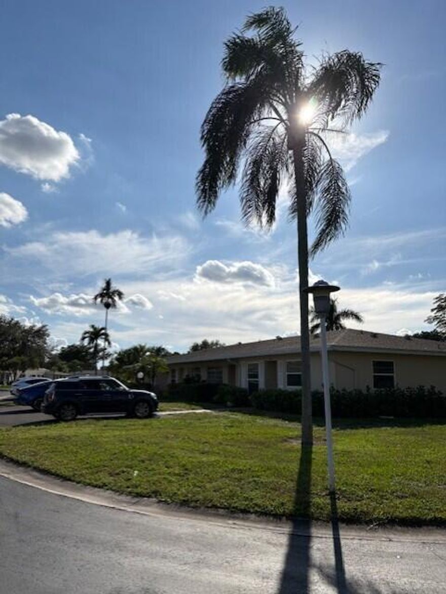 Beautiful well maintained villa in Boca Lakes.  Tastefully renovated with white kitchen cabinets, newer appliances, new bathroom, custom window treatments, laminate flooring thru out with tile in kitchen and bath.  Property backs to a green area.  Storage space on the back of villa.  NEW IMPACT WINDOWS AND DOORS! Elec. Panel box replaced.  Active 55 and over community conveniently located near shopping, restaurants, expressways.