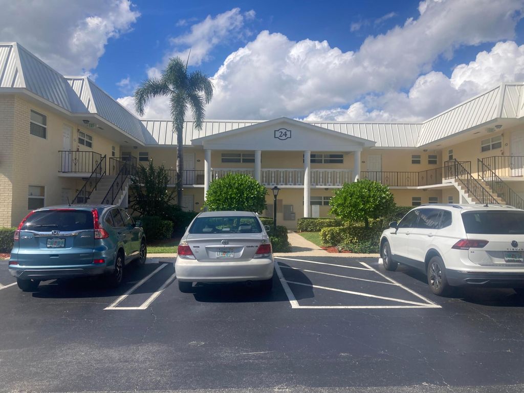 Photo of 24 Colonial Club Drive #102, Boynton Beach, FL 33435 (MLS # R11136083)