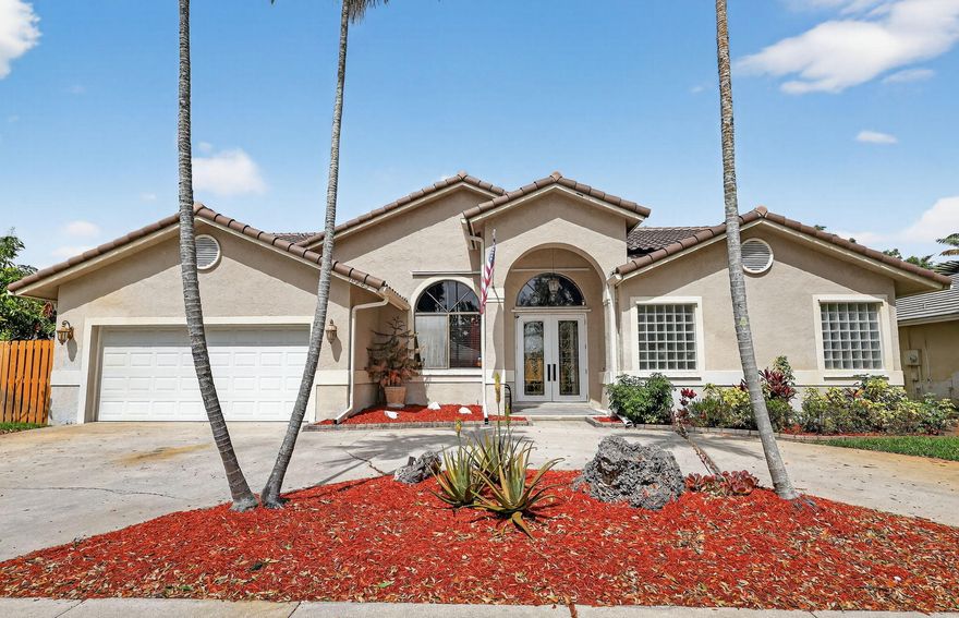 Welcome to this inviting 4-bedroom pool home in Emerald Lakes Estates! Boasting over 2,200 sq ft of CBS construction, this residence features stunning hardwood floors for a warm, sophisticated feel. The heart of the home is a functional kitchen, updated in 2025 with soft-close cabinets, granite countertops, a center island, and premium Bosch induction oven and microwave, plus a reverse osmosis system at the sink and fridge. Step outside to your private oasis! The fully fenced backyard (2026) features a 30x15 screened-in pool & covered patio. This move-in-ready gem offers total peace of mind with a 2023 roof, 2025 professional interior paint, 2-car garage, and circular driveway. The primary suite includes stylish bathroom updates from 2023.