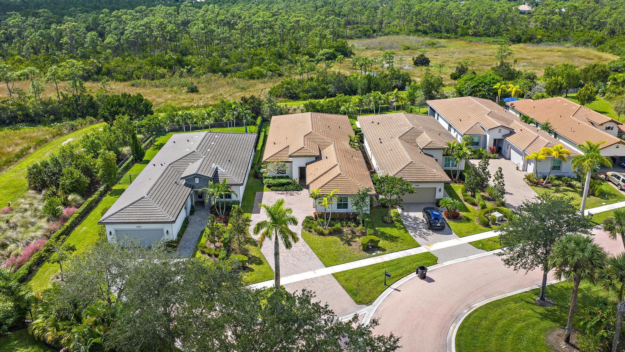 One of the newest homes in Ibis, this 2022-built Lennar ''Sparrow'' model enjoys a premium cul-de-sac location, an oversized yard, and pristine views of the nature preserve. Move-in perfect and masterfully designed, this 3BR/3BA+Den residence captures the essence of modern luxury living within the award-winning Club at Ibis. Set on an expansive 195 x 55 ft. lot with bright southwest exposure, the property offers exceptional privacy and a deep connection to the surrounding natural beauty. The oversized lot accommodates an extra-long driveway leading to a side-entry, full three-car garage--a rare and desirable feature at this price point. The spacious backyard provides ample room to design and build a large custom pool, while the generous covered patio offers shade and year-round enjoyment.