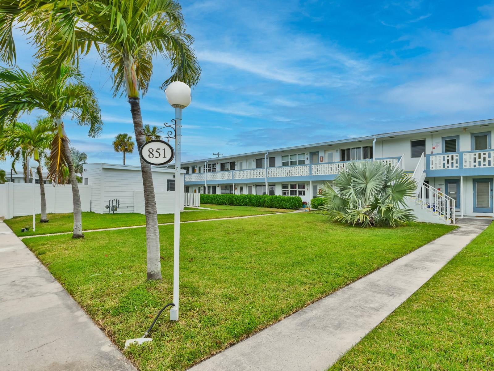 READY TO MOVE-IN and ONLY $300 / MONTH MAINTENANCE! Charming 1st FLOOR unit sold FURNISHED TURNKEY within 1 MI. from Hallandale Beach. This Coop OWNS HER LAND, no land lease here. This unit features New IMPACT WINDOWS & DOORS (2024). Upgraded KITCHEN with newer glossy white cabinets, ceramic countertop & newer appliances (2017). Large pantry inside. Clean Ceramic & Laminated wood floor through. Bright living room, well-furnished with sofa-bed and wall mounted flat screen TV. Updated bath with newer vanity, medicine cabinet & toilet. The bedroom has a wall-to-wall closet. Chest freezer & bicycle included. Amenities included heated pool, BBQ area, shuffleboard, laundry rm, extra storage. No rentals but family members are allowed to use the unit. CASH ONLY & 55+ BLDG. Walk to shops, casino...