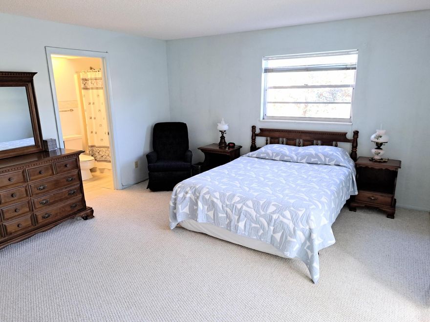 ONLY UNIT WITH 1.5 BATH UNDER $100K
Furnished or unfurnished first-floor residence featuring 1.5 bathrooms, ceiling fans, washer and dryer hookup and a spacious Florida room. Located in the desirable Vista Gardens 55+ community.  Residents enjoy an active lifestyle with amenities including golf, tennis, fitness center, shuffleboard, billiards, card rooms, social activities, a heated infinity pool, hot tub, and more. Conveniently situated just 10 minutes from the beach.