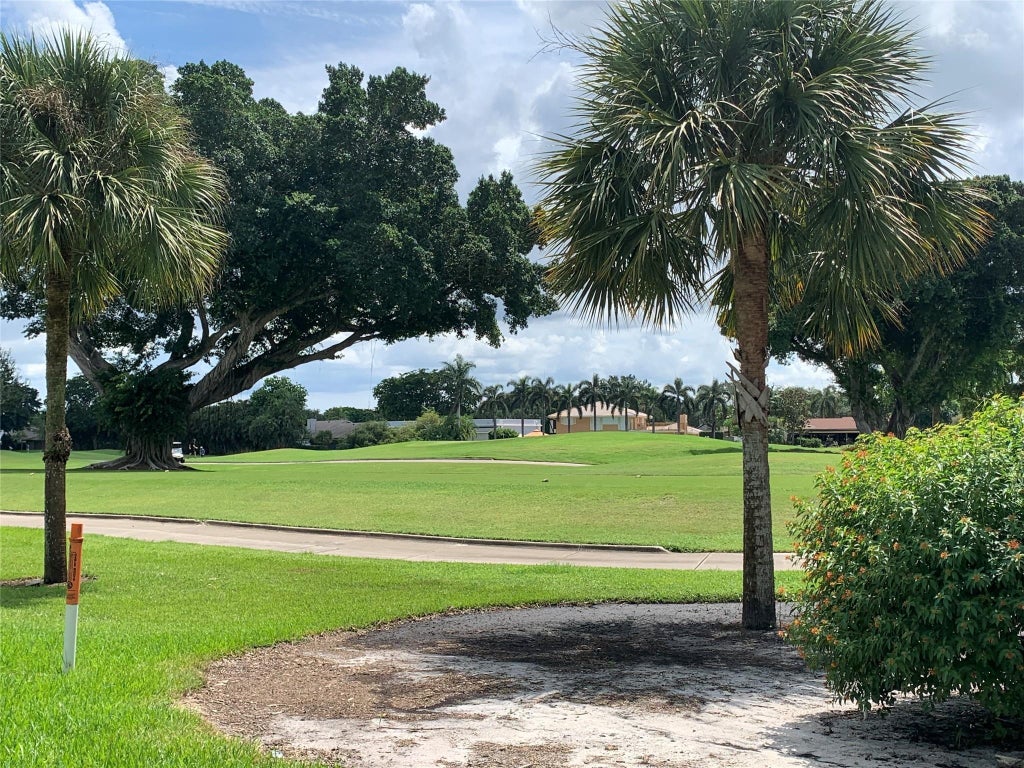 Photo of 200 Jacaranda Country Club Drive #1b, Plantation, FL 33324 (MLS # B26037286)