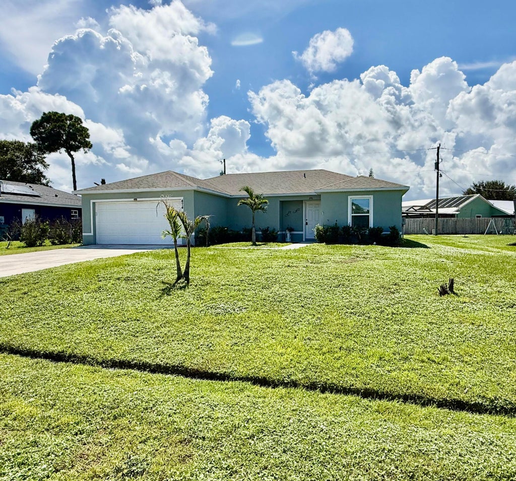 Photo of 474 NE MAINSAIL Street, Port Saint Lucie, FL 34983 (MLS # B26074543)