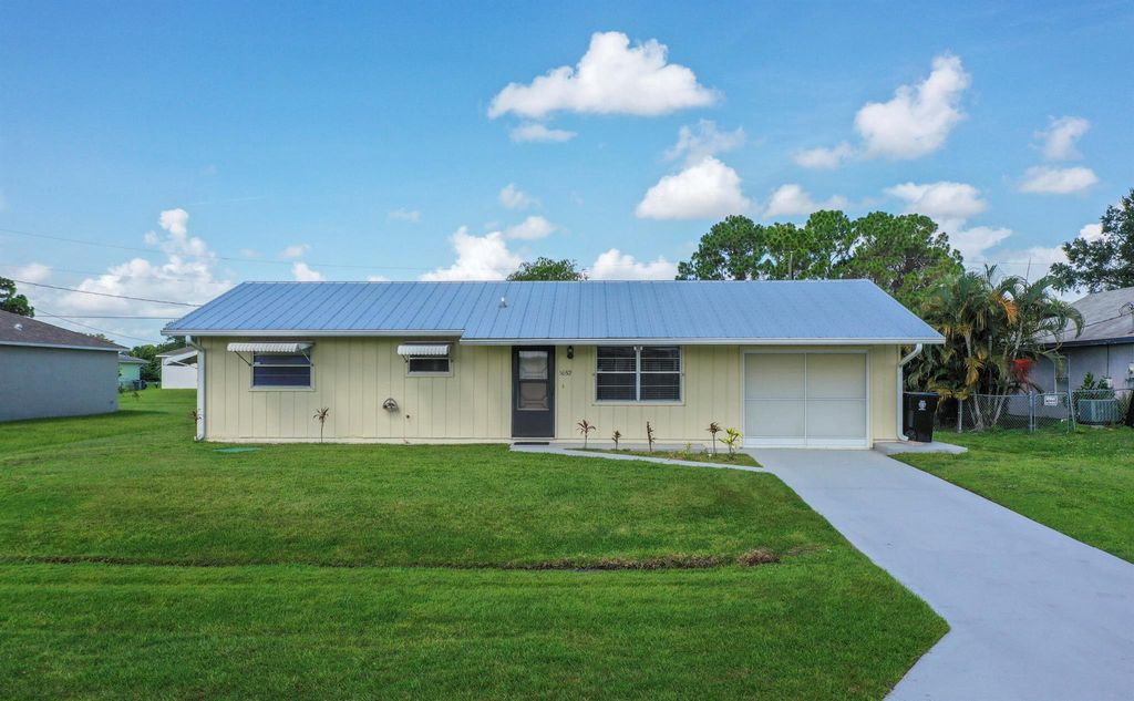 Photo of 1652 SW Angelico Lane, Port St Lucie, FL 34984 (MLS # R10904238)