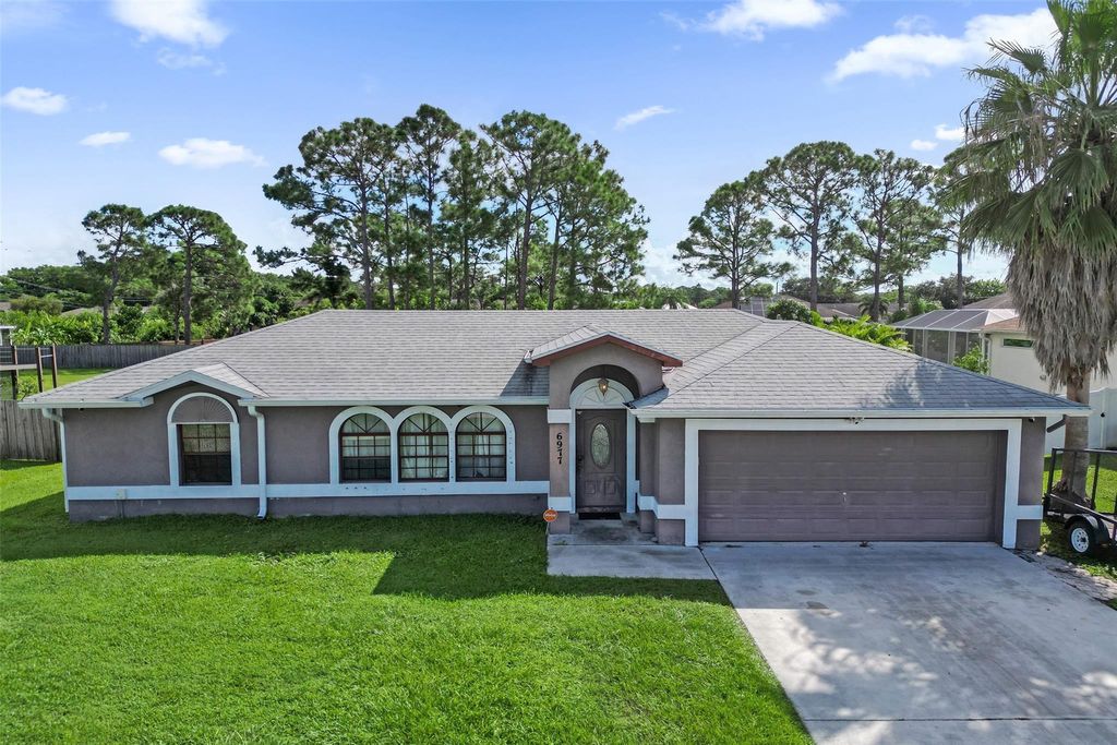 Photo of 6977 NW Hartney Way, Port Saint Lucie, FL 34983 (MLS # F10526709)