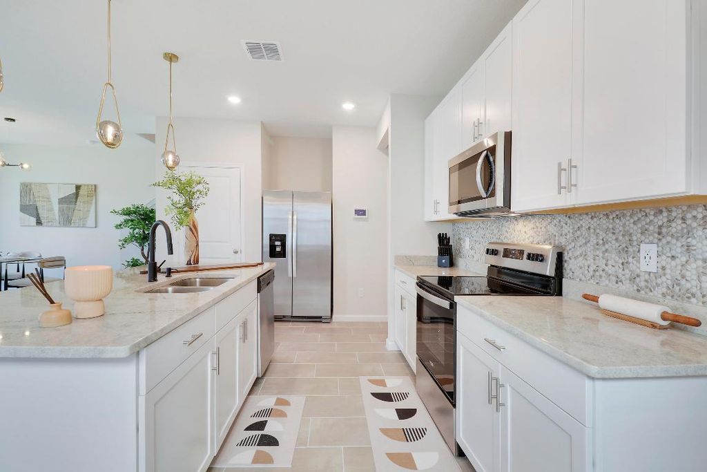 Photo of 261 Osprey Preserve Boulevard, Jensen Beach, FL 34957 (MLS # R10910234)