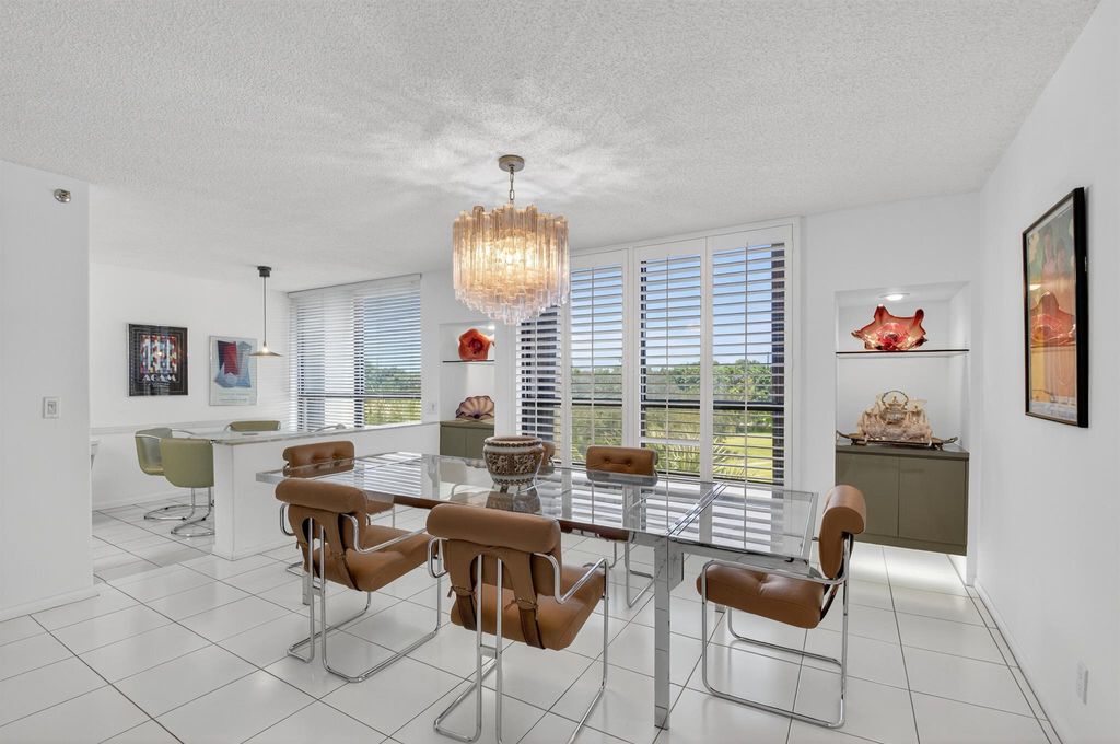 Photo of 20090 Boca West Drive #354, Boca Raton, FL 33434 (MLS # R11109411)